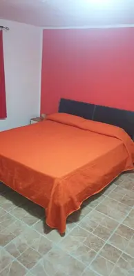 Letto o letti in una camera di Love nest Parma
