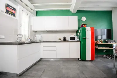 Cucina o angolo cottura di ITALIA HOUSE TORTELLINOSUITE Modena