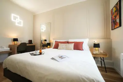 Letto o letti in una camera di Mazzini's Rooms