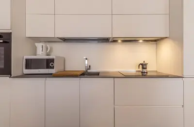 Cucina o angolo cottura di Suite Rua Pioppa - Affitti Brevi Italia