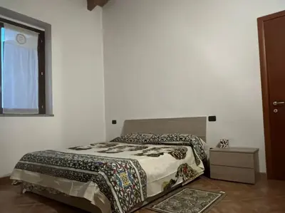 Letto o letti in una camera di ERIK 31Appartamento confortevole