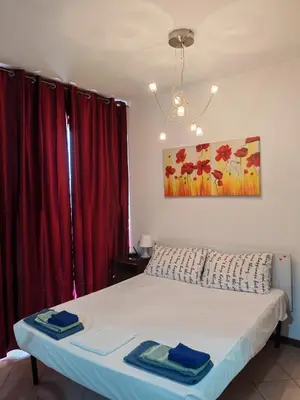 Letto o letti in una camera di Casa Angela Parma