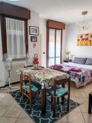 Letto o letti in una camera di Casa Angela Parma
