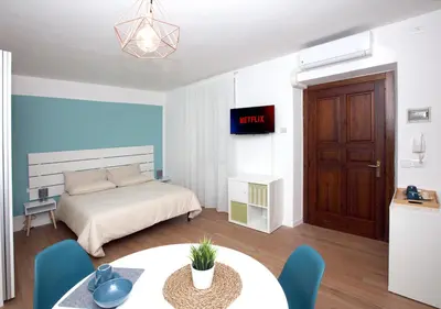 Letto o letti in una camera di Blue Mind