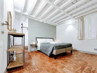 Letto o letti in una camera di Modena Prestige, la Porta sul Centro