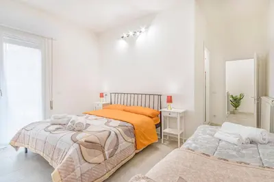 Letto o letti in una camera di Mutina Design Suite - City life & Hesperia Hospital