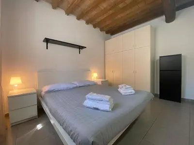 Letto o letti in una camera di Casa Fabrizio - Nice Suite con parcheggio su richiesta