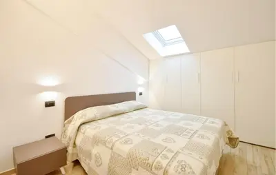 Letto o letti in una camera di 2 Bedroom Amazing Apartment In Moneglia