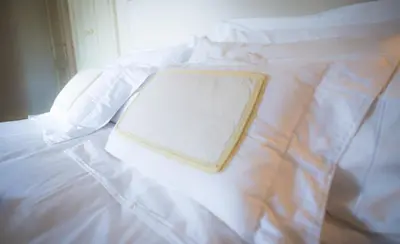 Letto o letti in una camera di Castello Di Mornico Losana
