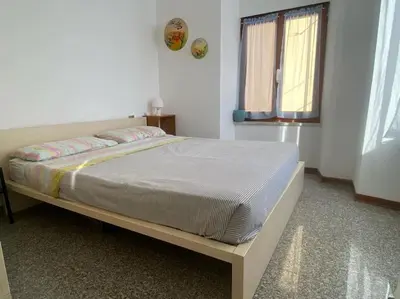 Letto o letti in una camera di La casa di Raffa