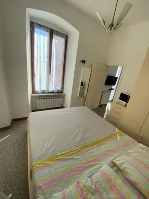 Letto o letti in una camera di La casa di Raffa