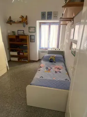 Letto o letti in una camera di La casa di Raffa