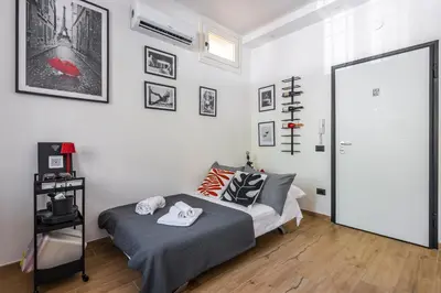 Letto o letti in una camera di The downtown loft Carpi Centro