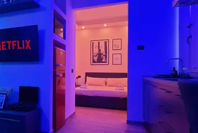 Letto o letti in una camera di The downtown loft Carpi Centro
