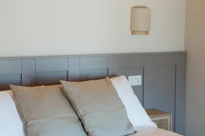 Letto o letti in una camera di Agriturismo La Costa