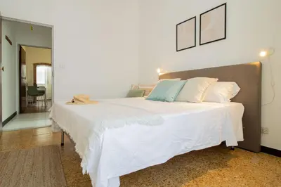 Letto o letti in una camera di 246 - Casa Marta, Centro Storico, 140metri dalla Baia del Silenzio PATRIMONIO UNESCO spiaggia e mare