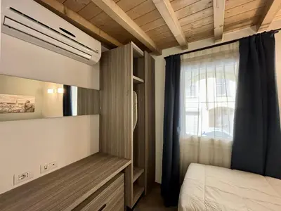 Letto o letti in una camera di Saragozza Suite 2 Intero appartamento in centro storico WIFI e parcheggio gratuito