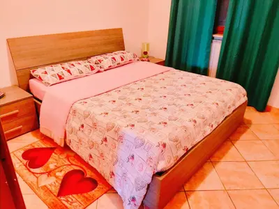 Letto o letti in una camera di Casa Maria 2