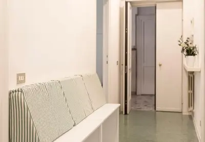 Area soggiorno di Appartamento al Duomo di Parma - posto auto privato prenotabile