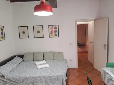 Letto o letti in una camera di Beautiful Center Apartments - posti auto privati prenotabili