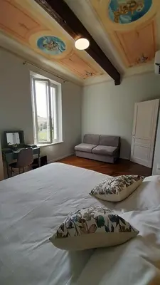 Letto o letti in una camera di B&B Villa Sofora