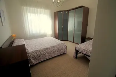 Letto o letti in una camera di I LIMONI