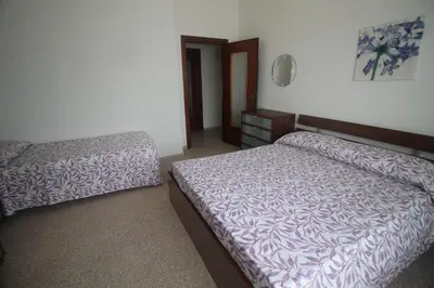 Letto o letti in una camera di I LIMONI