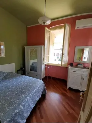 Letto o letti in una camera di Villa Lina
