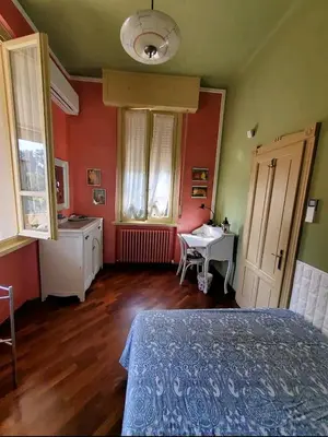 Letto o letti in una camera di Villa Lina