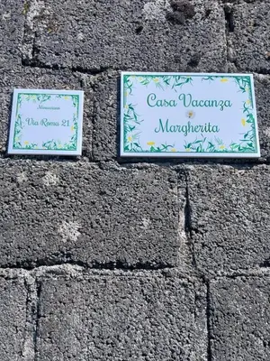 Certificato, attestato, insegna o altro documento esposto da Casa Vacanza Margherita