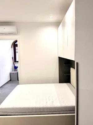 Letto o letti in una camera di Appartamentino SILVER WHITE