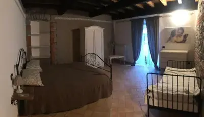 Letto o letti in una camera di Ca d Andrea