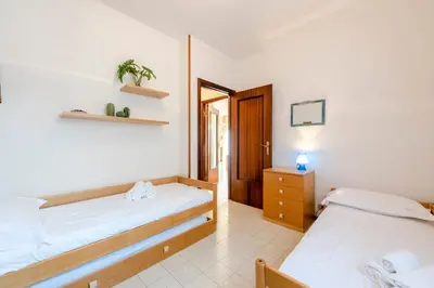 Letto o letti in una camera di Peaceful Apartment In Deiva Marina - Happy Rentals