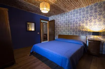 Letto o letti in una camera di Charming & Authentic Stone House La Brugna