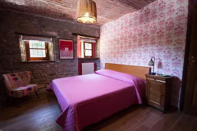Letto o letti in una camera di Charming & Authentic Stone House La Brugna