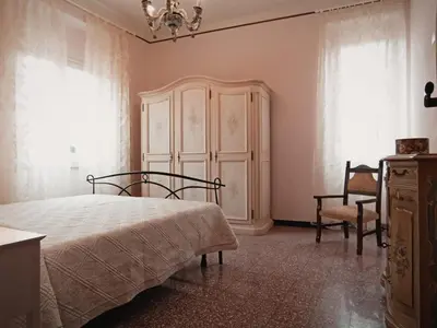 Letto o letti in una camera di Casa Gina, Levanto