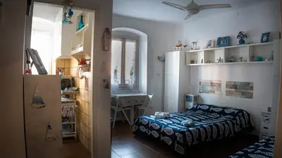 Letto o letti in una camera di Paradiso blu Riva Trigoso
