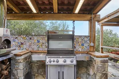 Cucina o angolo cottura di Idyllium Relais - Private Retreat with Panoramic Pool & Sea Views