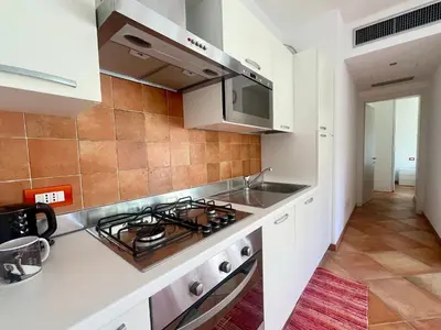 Cucina o angolo cottura di Glicine Residenza Prealba con posto auto