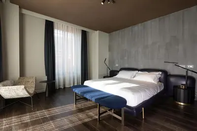 Letto o letti in una camera di Palazzo Utini