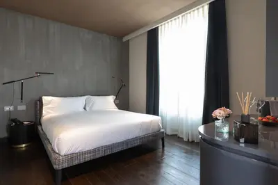 Letto o letti in una camera di Palazzo Utini