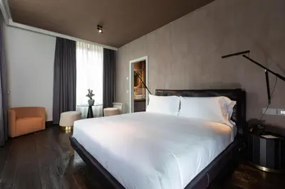 Letto o letti in una camera di Palazzo Utini