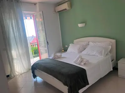 Letto o letti in una camera di [10 min. dalla spiaggia] Double Suite nel verde