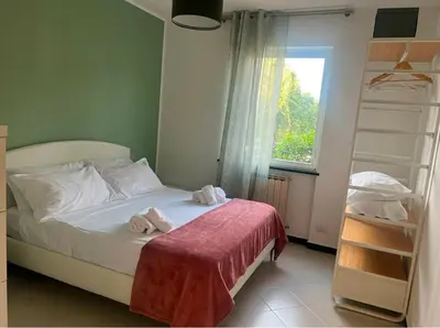 Letto o letti in una camera di [10 min. dalla spiaggia] Double Suite nel verde