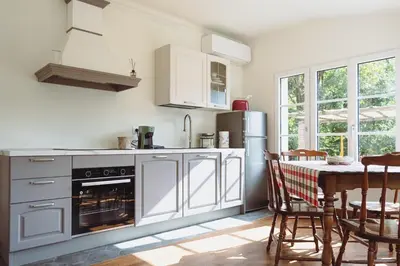 Cucina o angolo cottura di Residenza Nemus Olea Mare e Montagna