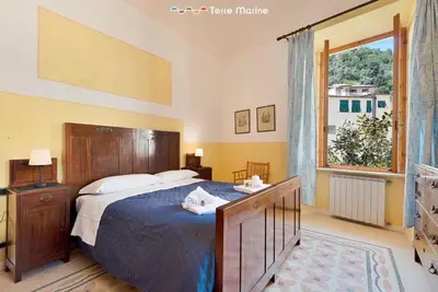 Letto o letti in una camera di Maison Monterosso, TerreMarine