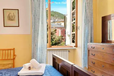 Letto o letti in una camera di Maison Monterosso, TerreMarine