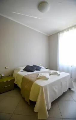 Letto o letti in una camera di CasaA