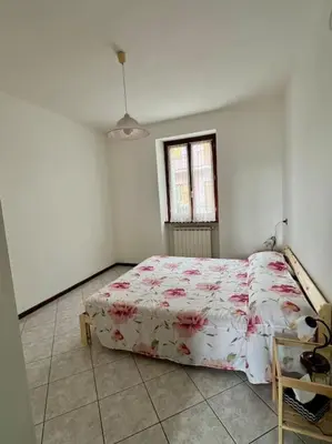 Letto o letti in una camera di Casa Anna Tornolo Val di Taro
