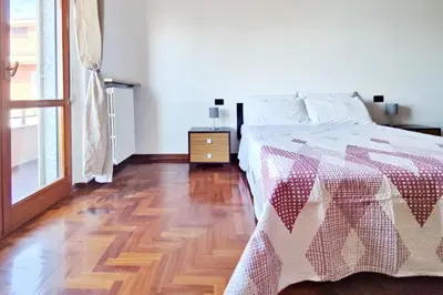 Letto o letti in una camera di Attico con Parcheggio Privato